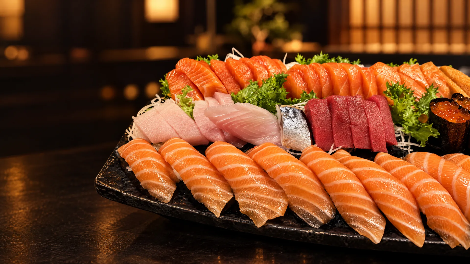 Large platter of salmon nigiri, tuna and sashimi at Kikoo Sushi Upper West Side