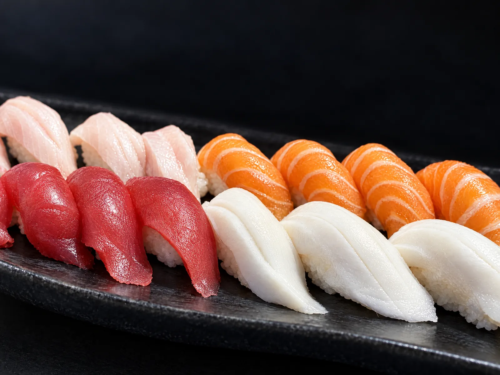 Tuna, salmon and white fish nigiri at Kikoo Sushi Upper West Side