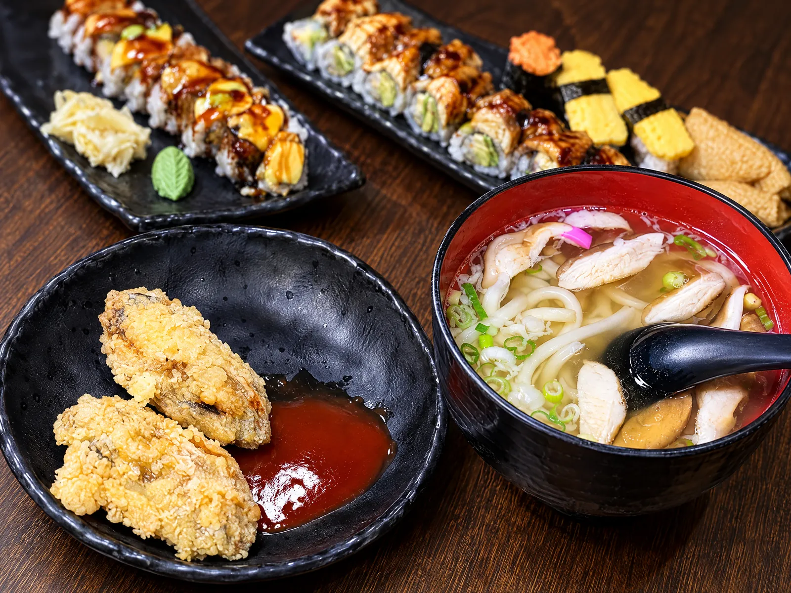 Tempura with dipping sauce and udon soup at Kikoo Sushi Upper West Side